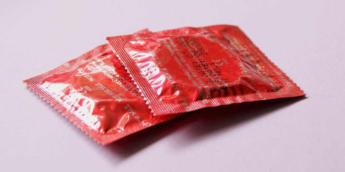 Condoms, Premature Education, and Fertility
